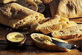 Ciabatta, slices cut, one slice buttered