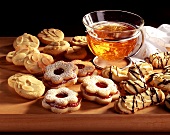 Biscuits (sand biscuits, Spitzbuben, bear's paws) & bowl of tea