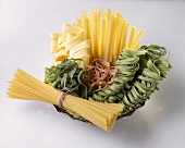 Spaghetti & various types of ribbon noodles in a bowl