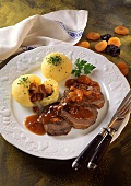 Braised pickled beef with dried fruit sauce & potato dumplings