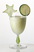 Lime and coconut drink in cocktail glass