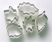 Five different cutters on white background