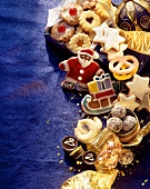 Colourful Christmas biscuits on a blue background