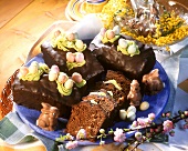Chocolate cake with sugar eggs & chocolate Easter bunnies