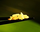 Rice Grains on Chopsticks