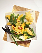 Mango & carambola salad with mangetouts, ginger-chili dressing