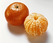 A Whole and Peeled Clementine