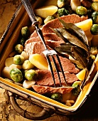 Boiled beef with potatoes and Brussels sprouts