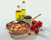 Salmon fillet in tomato sauce with basil