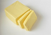 A piece of butter, two slices cut off