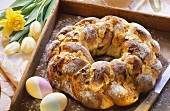 Bread Easter wreath with raisins and flaked almonds