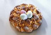 Bread Easter wreath, with three Easter eggs in the middle