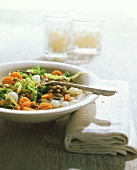 Lentil and vegetable stew in deep plate