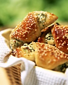 Potato crescents with sesame and sheep's cheese filling