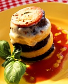 Polenta and aubergine tower, with toasted cheese