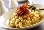 Risotto with salami on plate