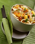 Fried noodles with pineapple, chili and coriander