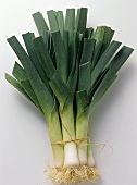 A bunch of leeks tied together with raffia
