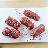 Securing roulades with clips, string and skewers