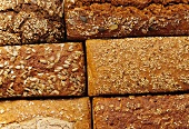 Several wholemeal loaves, filling the picture