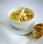 Spicy chicken soup with potatoes and leek