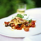 Grilled tuna on bean and tomato salad