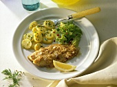Fried red perch fillet with potato salad