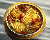 Potato gratin with apples and bacon