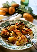 Potatoes with bacon and bay leaves