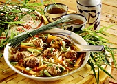 Noodle soup with meatballs and vegetables