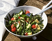 Bean salad with tomatoes, avocados & spring onions