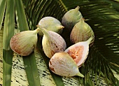 Several figs, whole and cut