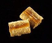 Two apricot and nut slices