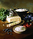 Various dairy products, berries and parsley