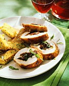 Stuffed chicken breast with polenta cakes