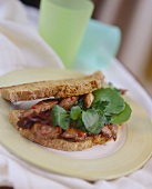 Warm chicken salad with watercress on bread