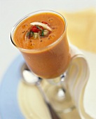 Chilled tomato soup with cucumber, onions and basil