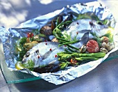Sea bream & mussels with asparagus & herbs in foil