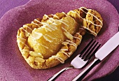 Puff pastry pear tartlets with flaked almonds
