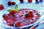 Red berry cream in glass bowl
