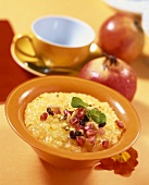 Saffron pudding with pine nuts and pomegranate seeds