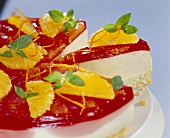 Cheesecake with Campari icing and oranges