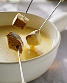 Fonduta (cheese fondue with bread cubes), Aosta Valley, Italy