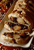 Puff pastry roulade with dried fruit & marzipan filling