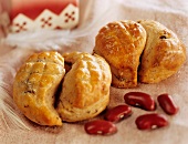 Pogatschen with red beans (small yeast pastry from Hungary)