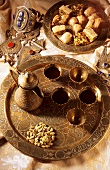 Middle Eastern coffee scene with mocha and pastries (Syria)