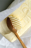 Butter with grooved wooden spoon