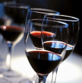 Wine glasses filled with red wine from Bordeaux