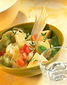 Potato salad with cucumber, tomatoes and chicory