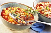 Chick pea stew with tomatoes, potatoes and chorizo sausage